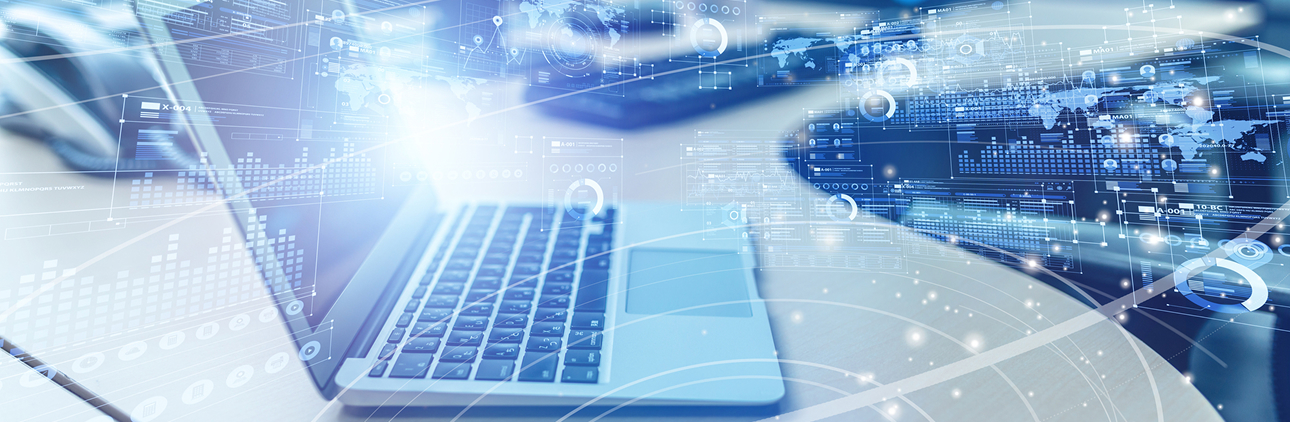 ノートパソコンと、その周囲に浮かび上がるデジタルデータやグラフのグラフィカルなイメージ